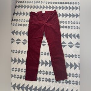 L’Agence velvet pants in rich red